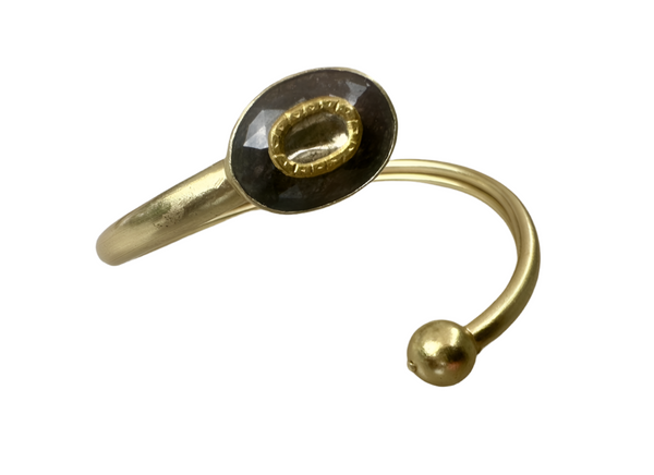 Limited Edition Gold Plated Twist Bangle with Sapphire Jadau