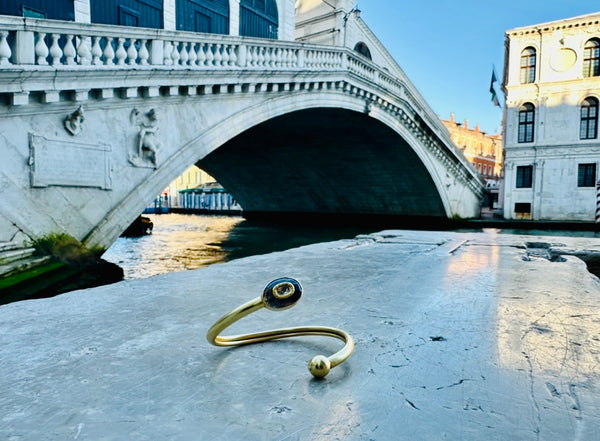 Limited Edition Gold Plated Twist Bangle with Sapphire Jadau